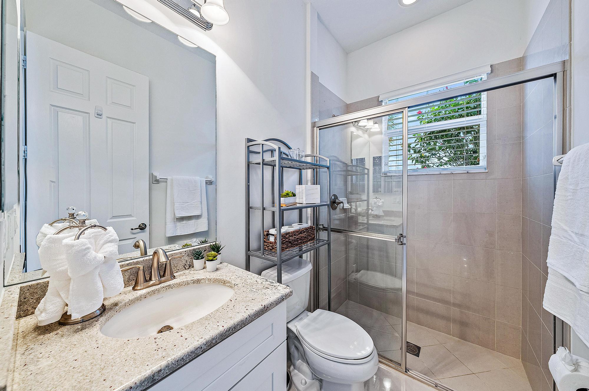 127 Steeple Circle Jupiter, FL 33458 - Photo 30 of 56 a bathroom with a sink toilet and shower