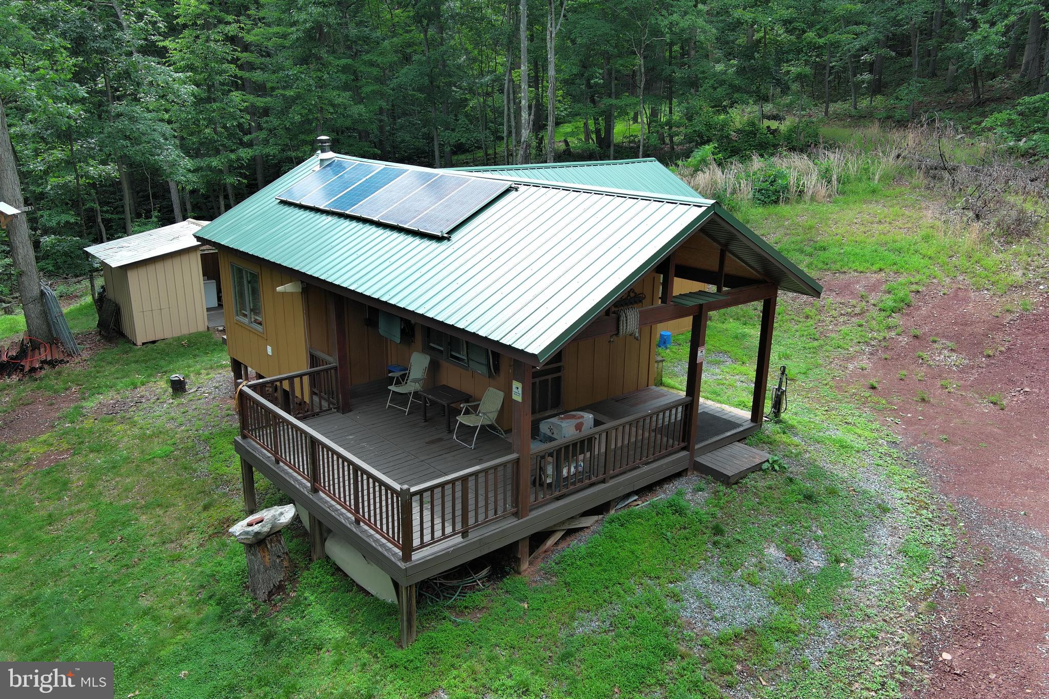 1419 Paul's Woods Road Delray, WV 26714 - Photo 99 of 105 an aerial view of a house with yard and trampoline
