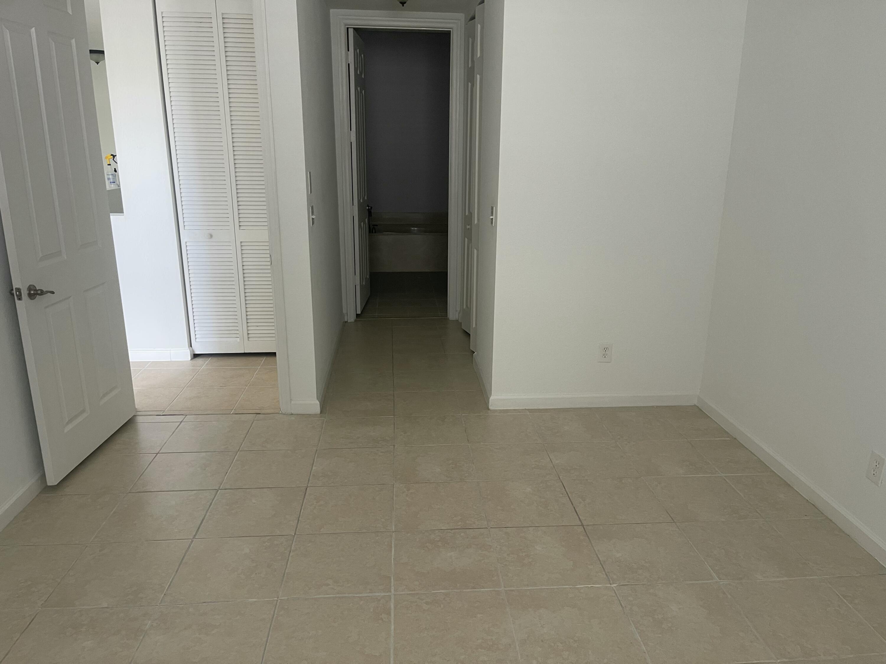 10440 Southwest Stephanie Way, Unit 211 Port St. Lucie, FL 34987 - Photo 7 of 13 IMG_2903