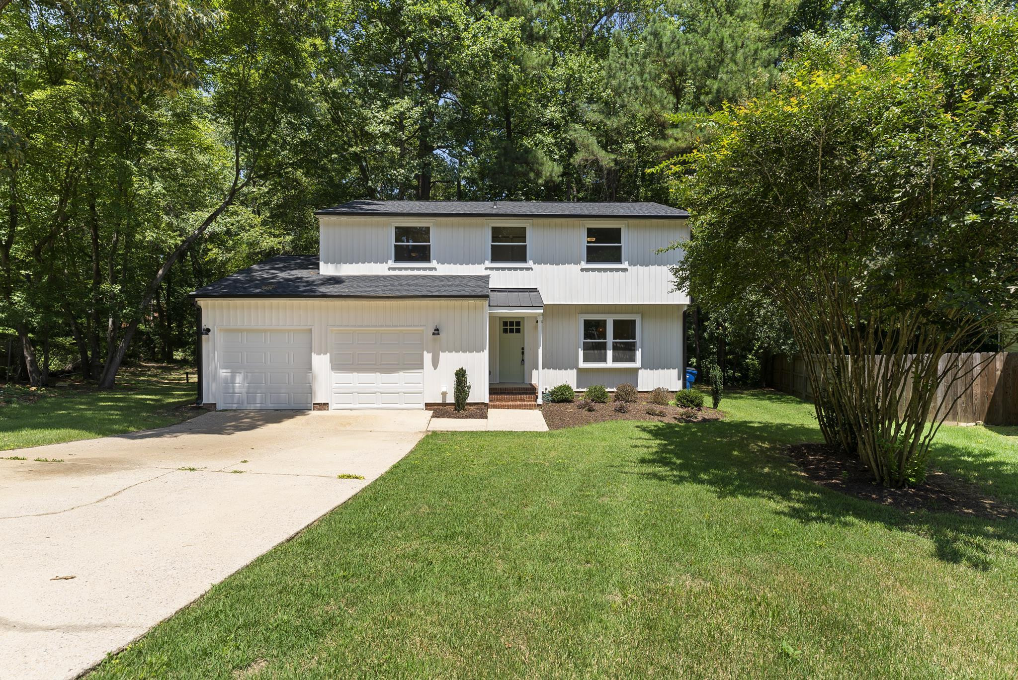 7604 Filgate Court Raleigh, NC 27615 - Photo 1 of 34 a front view of house with yard and green space
