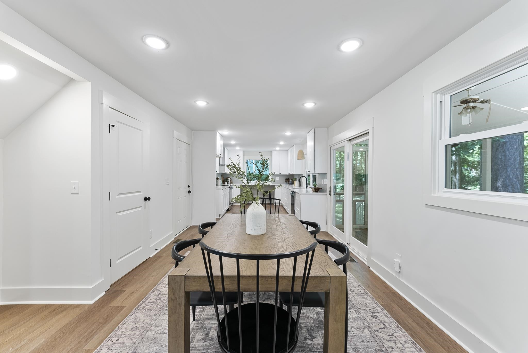 7604 Filgate Court Raleigh, NC 27615 - Photo 13 of 34 a view of a dining room with furniture window and wooden floor