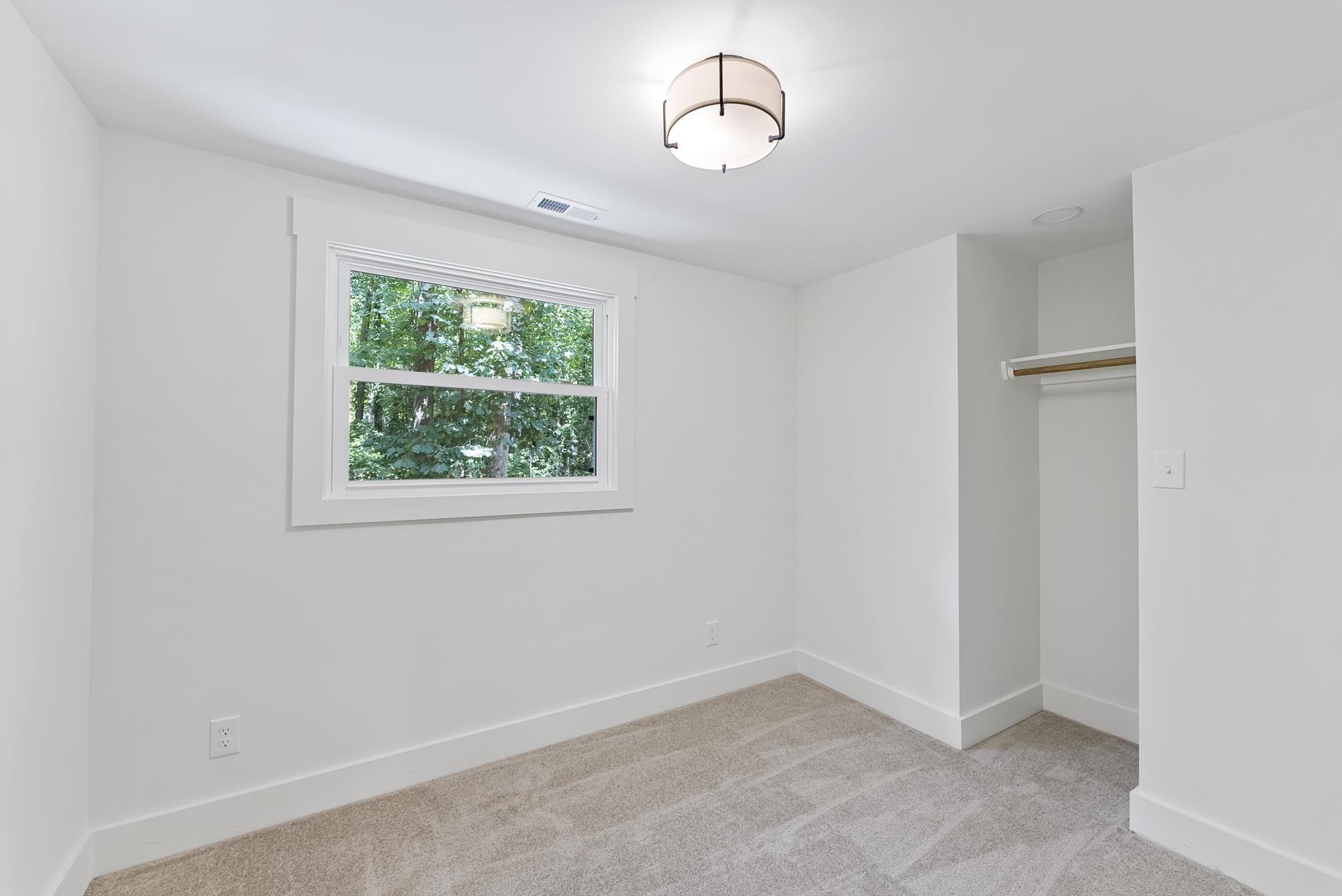 7604 Filgate Court Raleigh, NC 27615 - Photo 24 of 34 an empty room with a window
