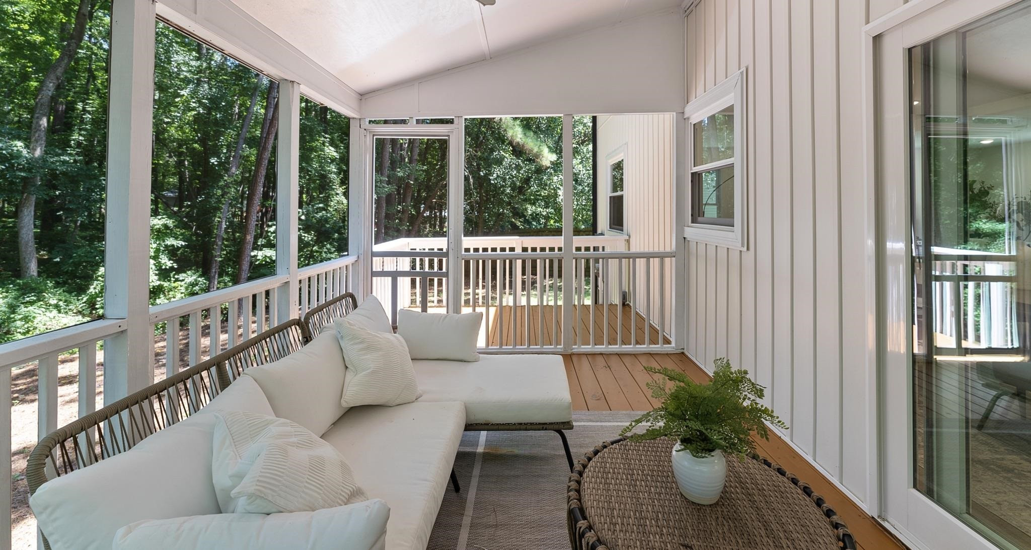7604 Filgate Court Raleigh, NC 27615 - Photo 31 of 34 a view of balcony with furniture and wooden deck