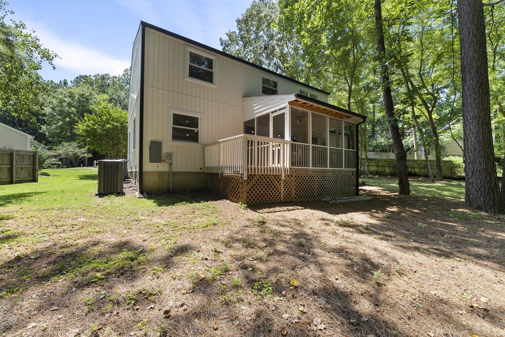 7604 Filgate Court Raleigh, NC 27615 - Photo 32 of 34 a front view of a house with a yard