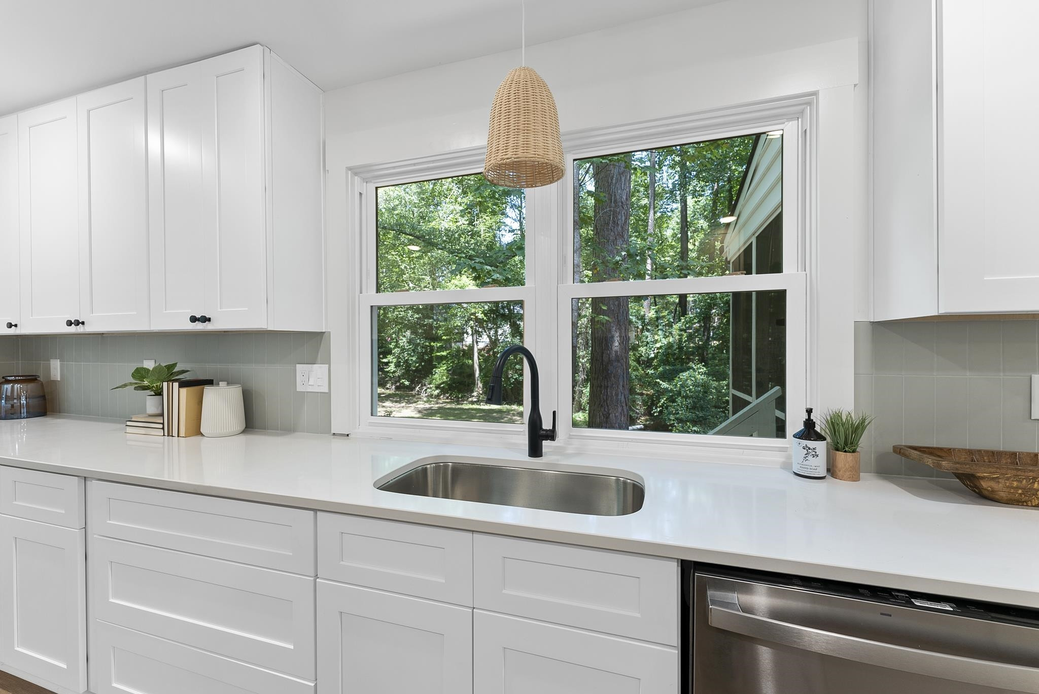 7604 Filgate Court Raleigh, NC 27615 - Photo 10 of 34 a kitchen with a sink and large window
