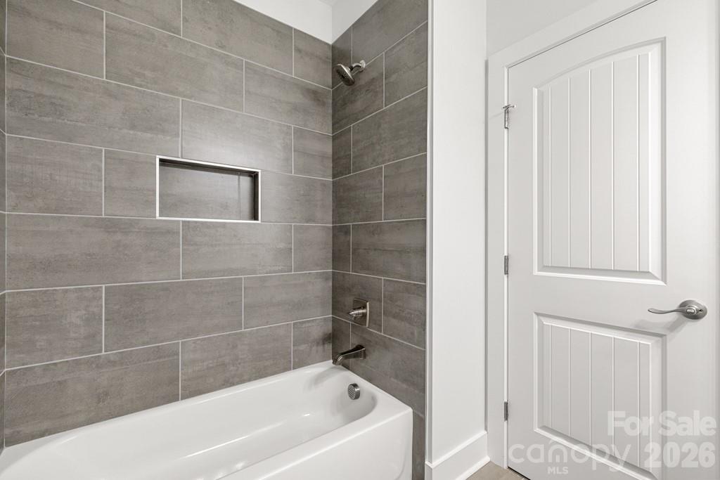 1212 Patterson Street Shelby, NC 28152 - Photo 20 of 24 a bathroom with a bathtub