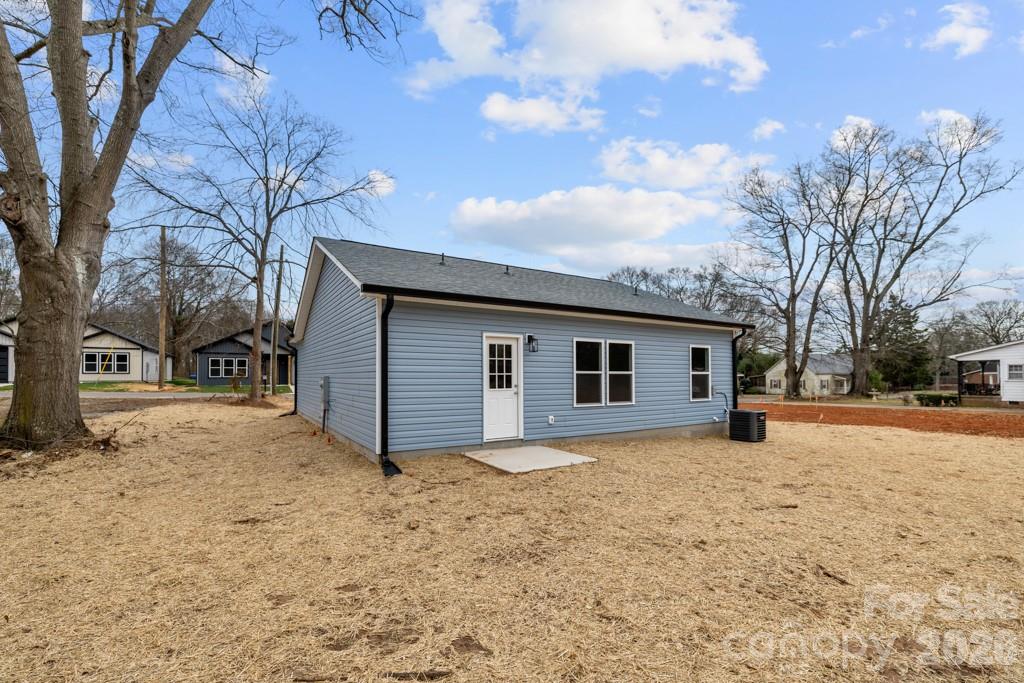 1212 Patterson Street Shelby, NC 28152 - Photo 21 of 24 a house that has a tree in front of it