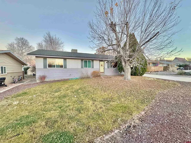 a front view of house with yard
