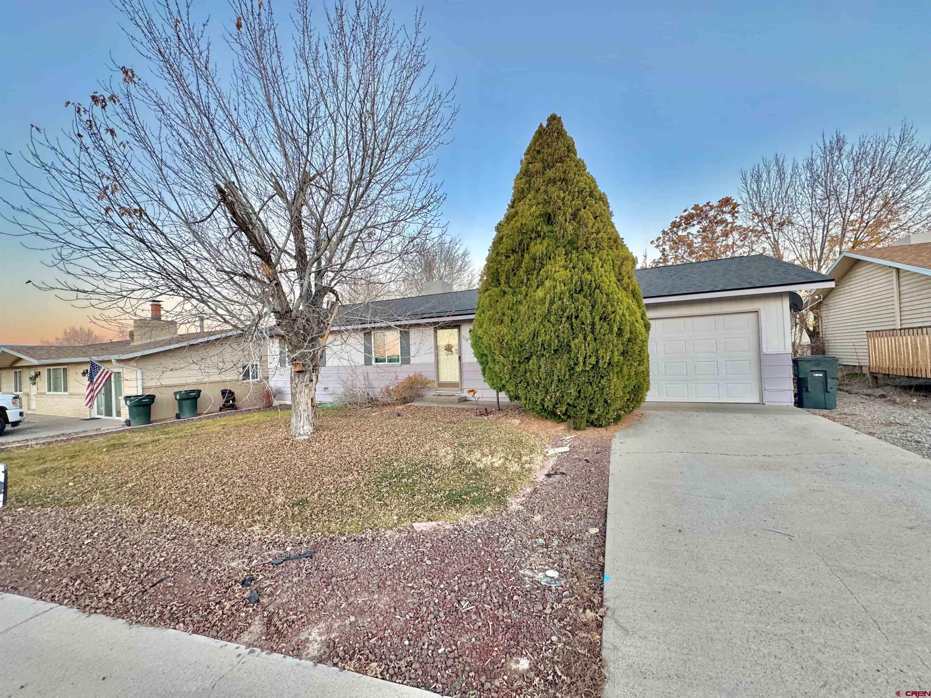 114 Cedar Street Delta, CO 81416 - Photo 31 of 31 a view of a yard in front of a house