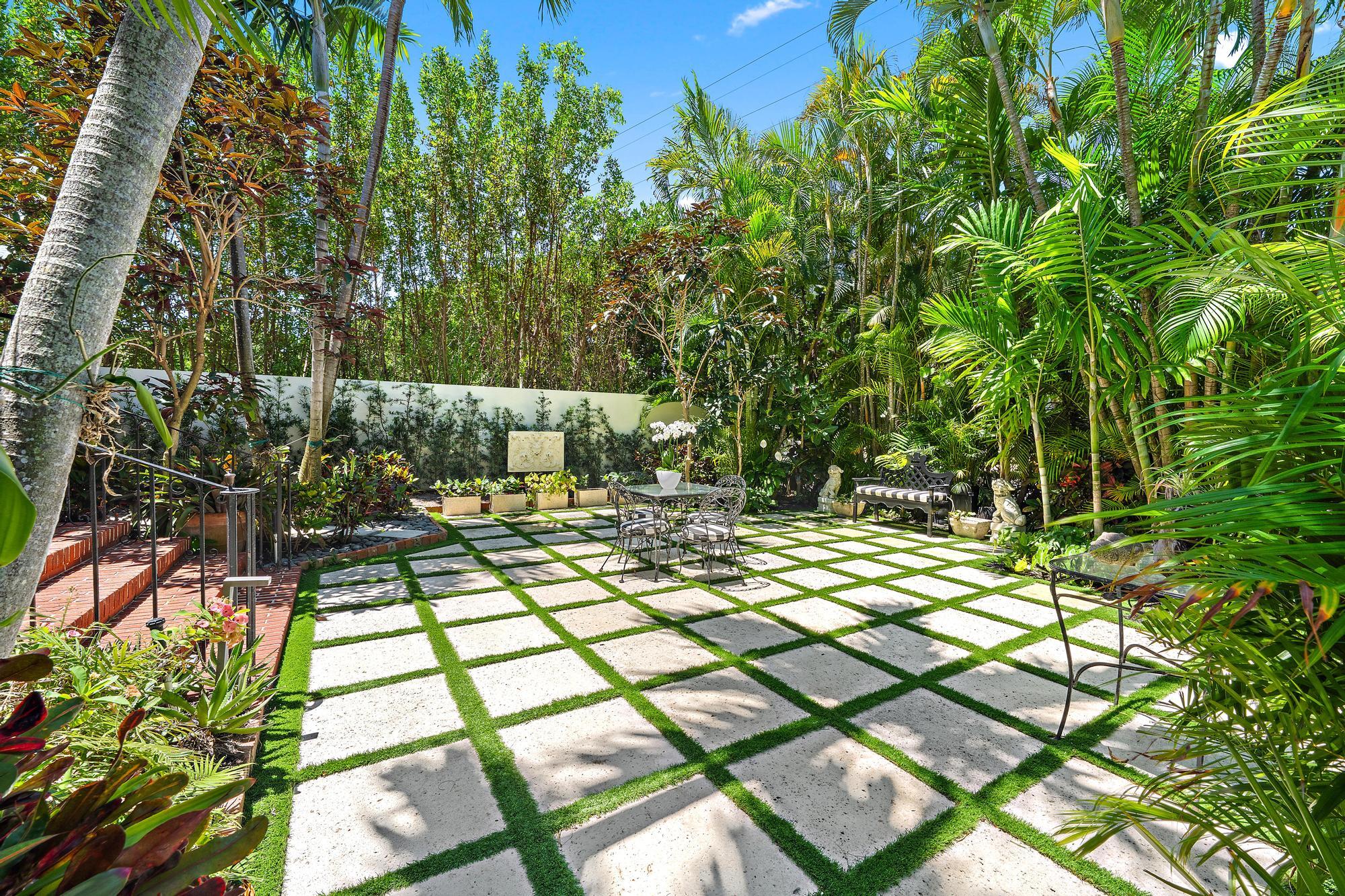 151 South County Road, Unit 1 Palm Beach, FL 33480 - Photo 13 of 18 a view of yard with large trees