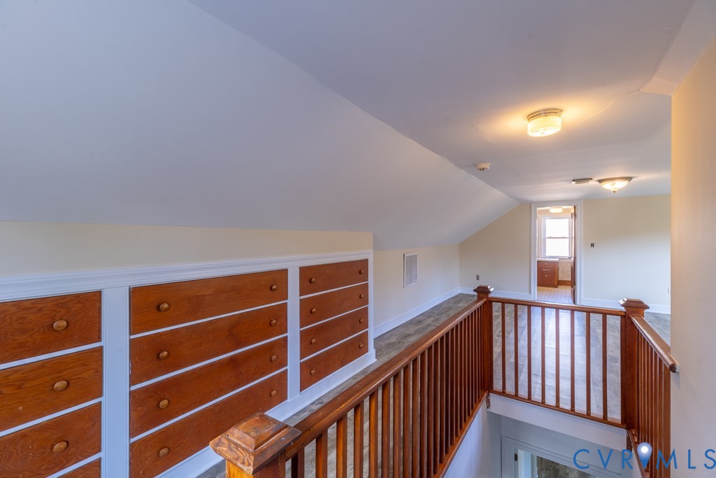 106 Courthouse Road Blackstone, VA 23824 - Photo 19 of 27 a view of a hallway with wooden floor and windows