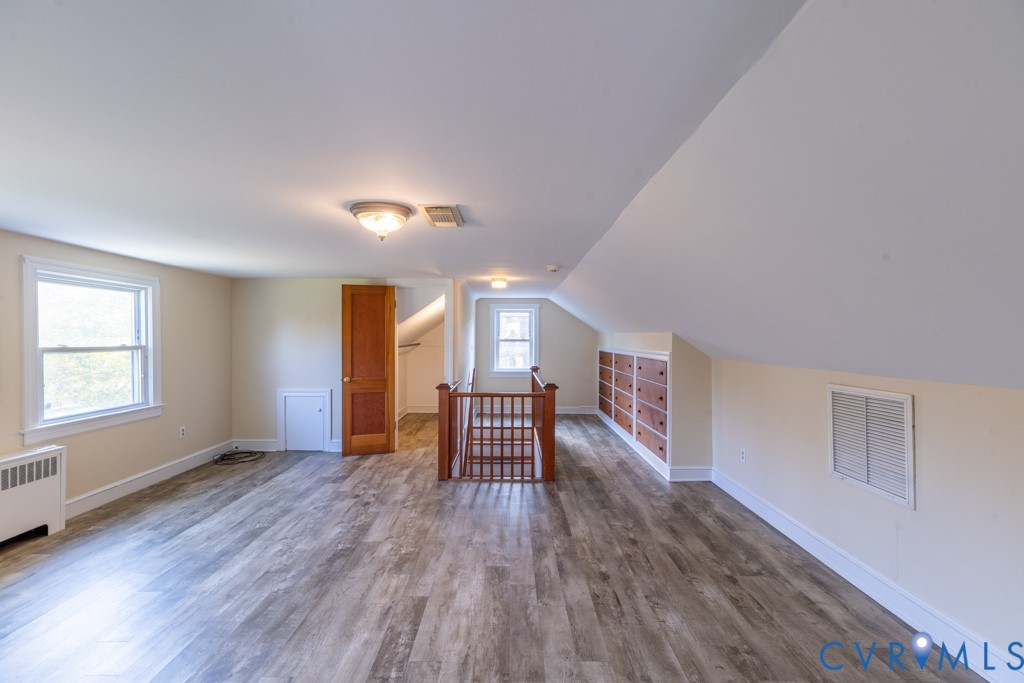 106 Courthouse Road Blackstone, VA 23824 - Photo 21 of 27 wooden floor in an empty room with a window