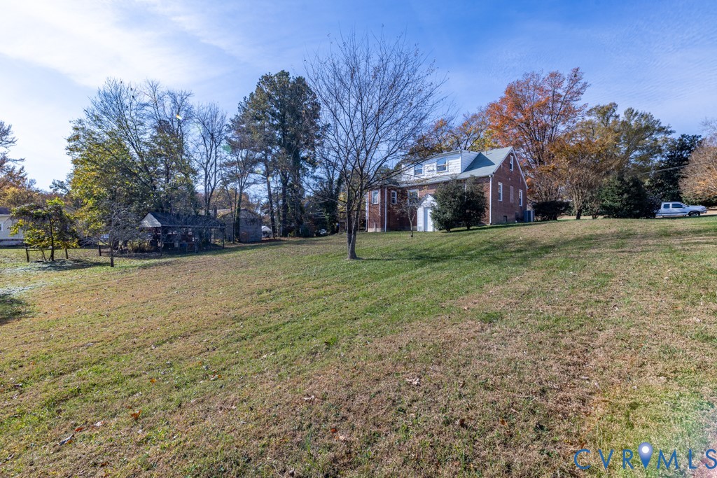 106 Courthouse Road Blackstone, VA 23824 - Photo 26 of 27 a front view of house with yard and trees