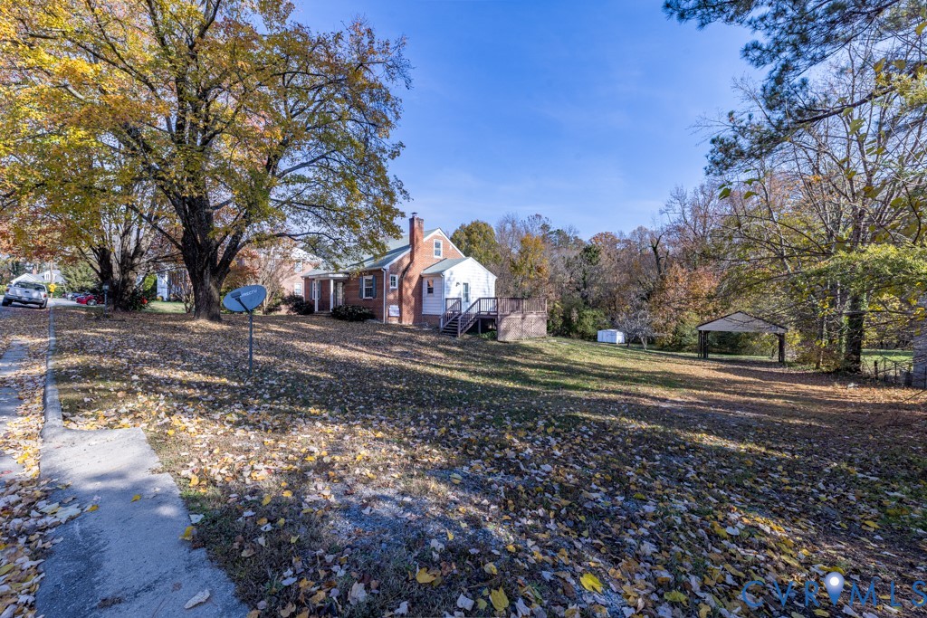 106 Courthouse Road Blackstone, VA 23824 - Photo 4 of 27 a view of dirt yard with a large tree