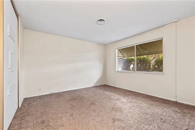 an empty room with window