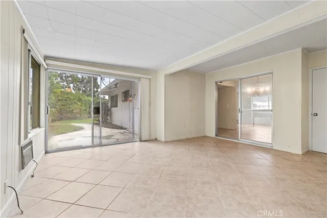 a view of an empty room and window