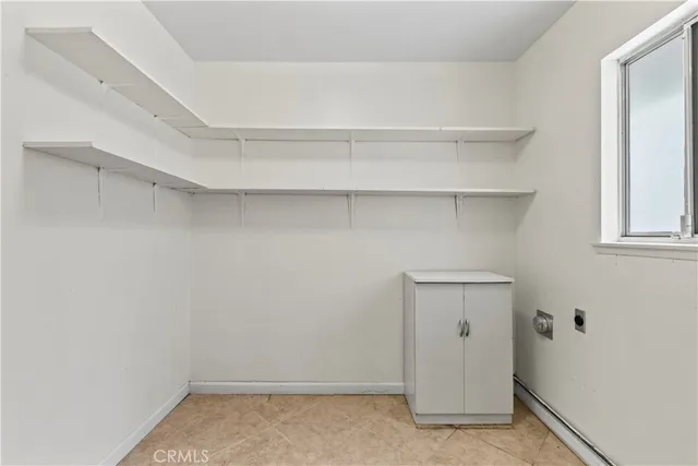 a view of an empty walk in closet