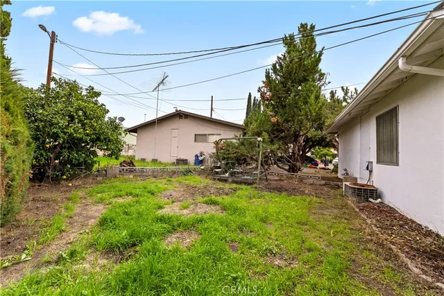 a house view with a garden space