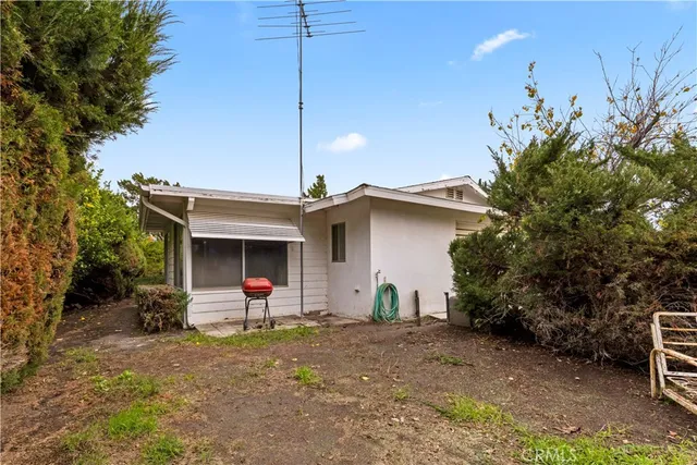 a front view of a house with yard