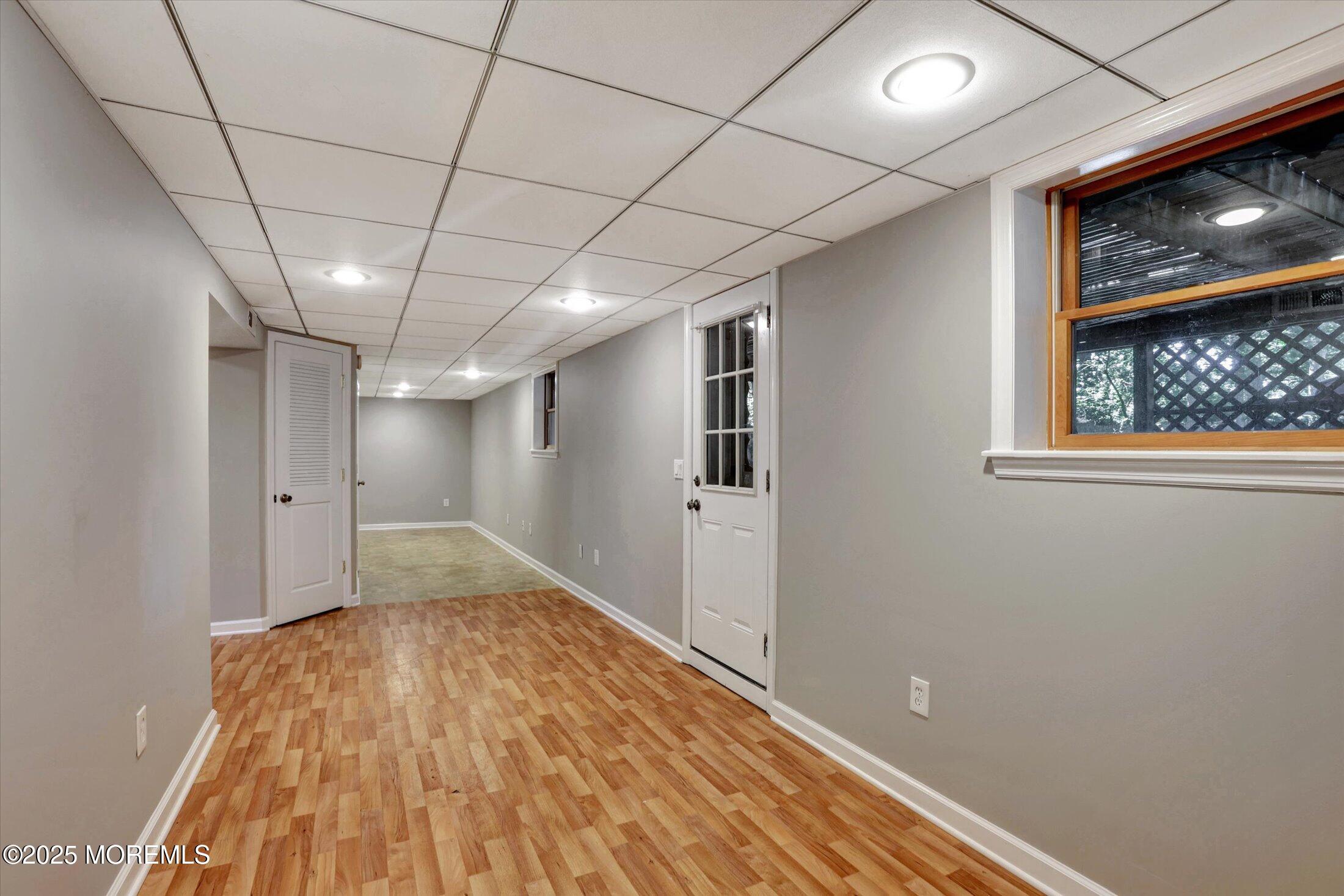 23 Princeton Drive Howell, NJ 07731 - Photo 18 of 32 a view of empty room with wooden floor