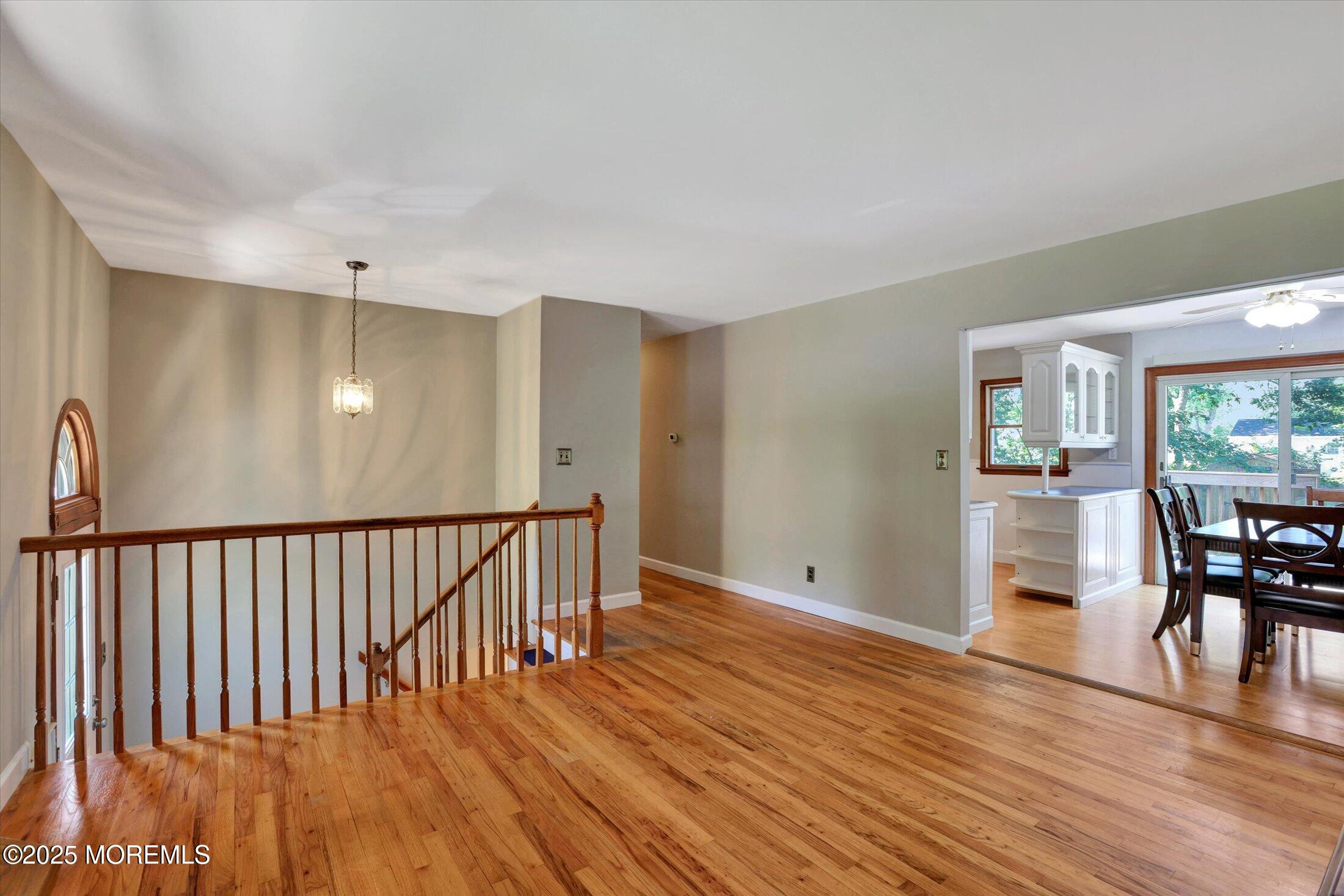 23 Princeton Drive Howell, NJ 07731 - Photo 2 of 32 a view of a room with wooden floor and furniture