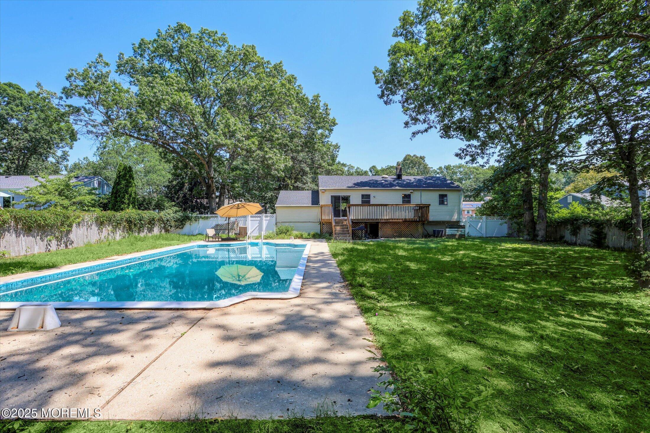 23 Princeton Drive Howell, NJ 07731 - Photo 24 of 32 a view of a houses with a yard