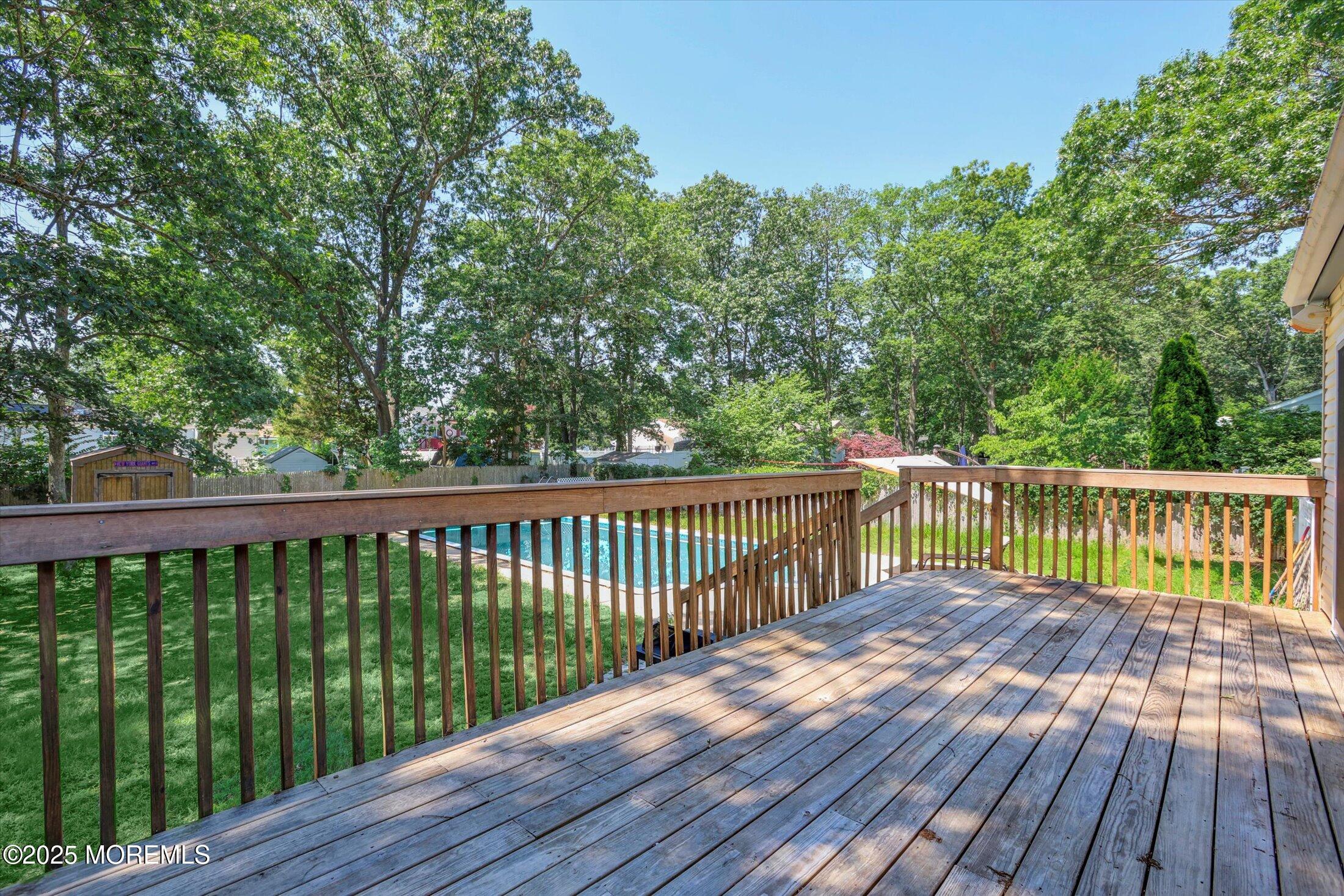 23 Princeton Drive Howell, NJ 07731 - Photo 26 of 32 a view of balcony with wooden floor