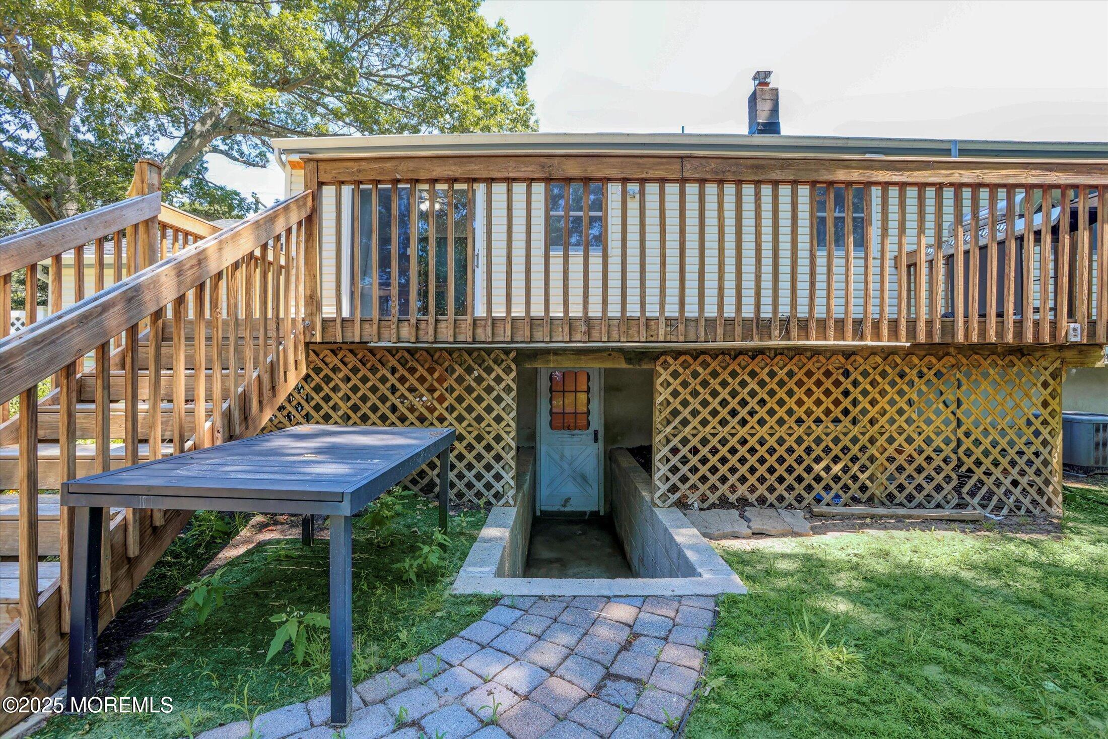 23 Princeton Drive Howell, NJ 07731 - Photo 31 of 32 a view of a patio with a table and chairs