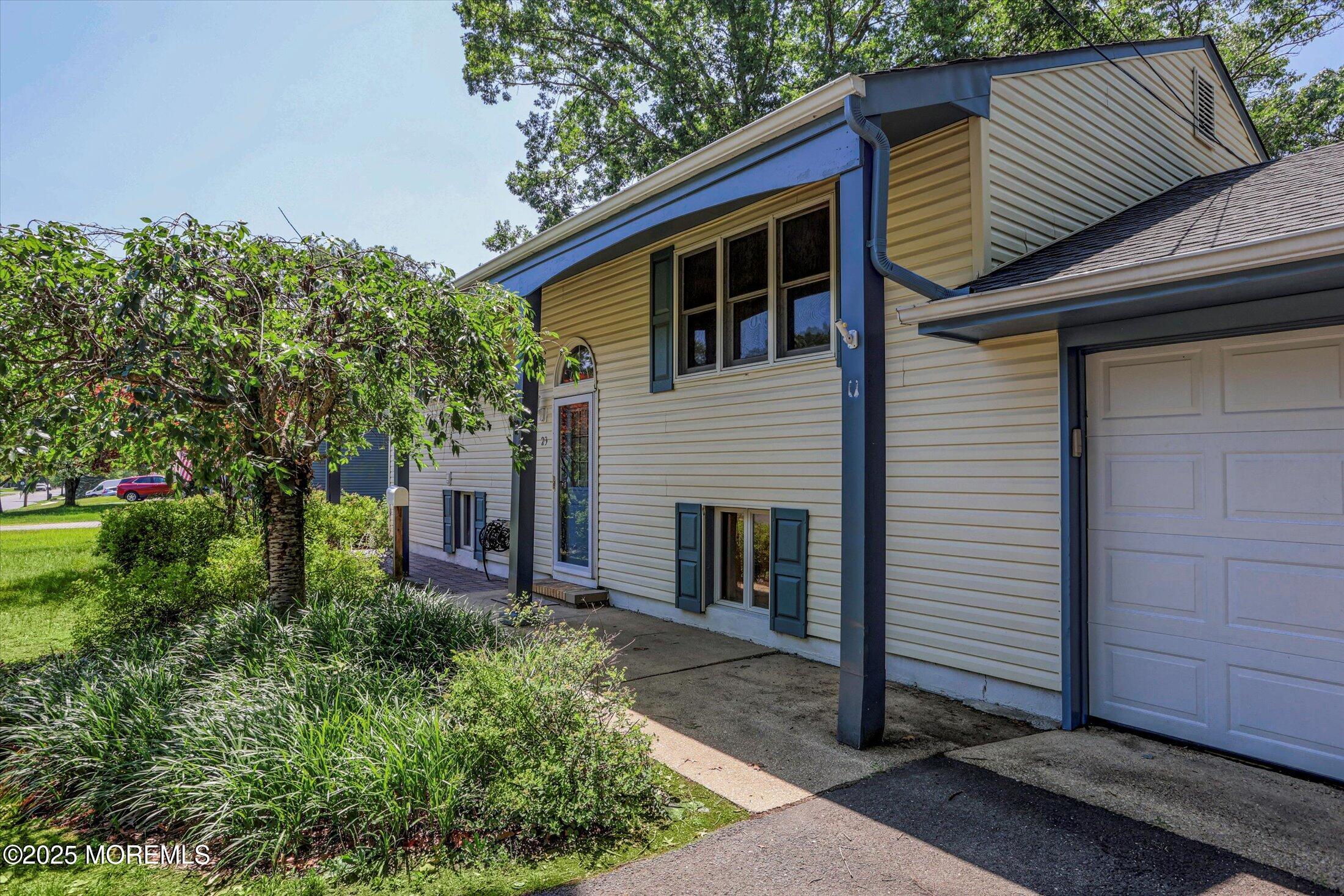 23 Princeton Drive Howell, NJ 07731 - Photo 32 of 32 a view of a house with a yard