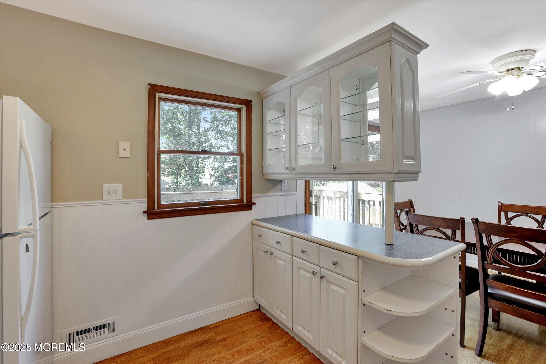 23 Princeton Drive Howell, NJ 07731 - Photo 8 of 32 a kitchen with stainless steel appliances a sink a stove and a refrigerator