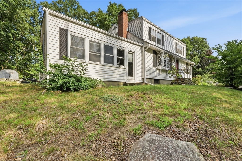 28 Spring Road Westborough, MA 01581 - Photo 36 of 42 a house view with a garden space