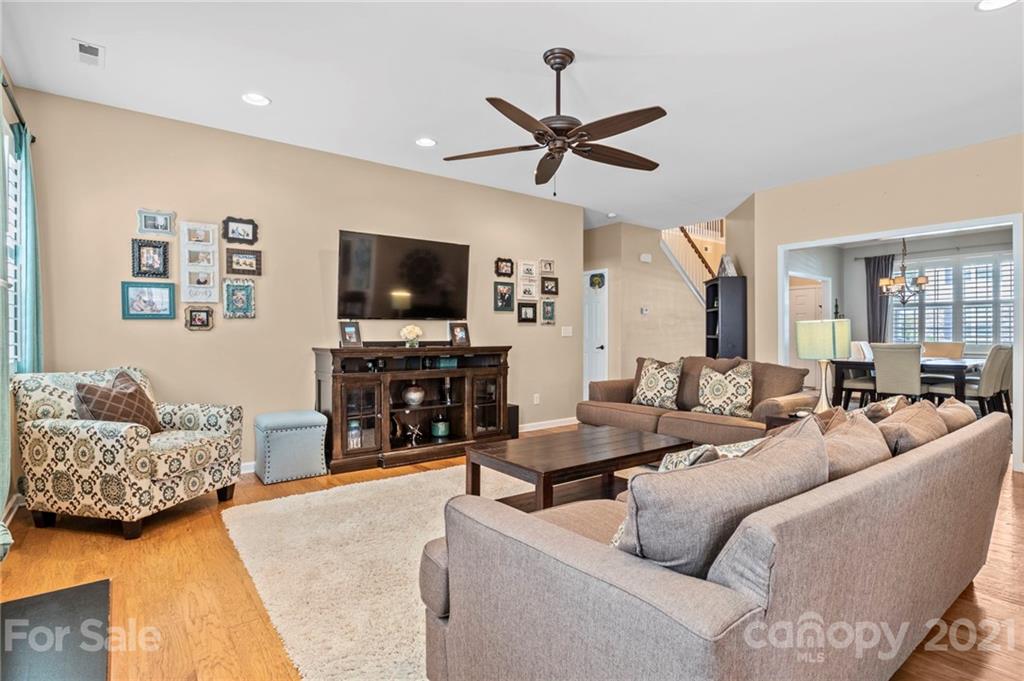 88 Roanoke Road Fletcher, NC 28732 - Photo 9 of 34 a living room with furniture and a flat screen tv