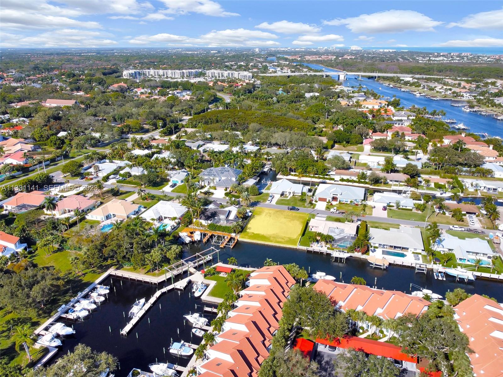 2400 Edward Road Palm Beach Gardens, FL 33410 - Photo 11 of 49 an aerial view of residential houses with outdoor space and trees