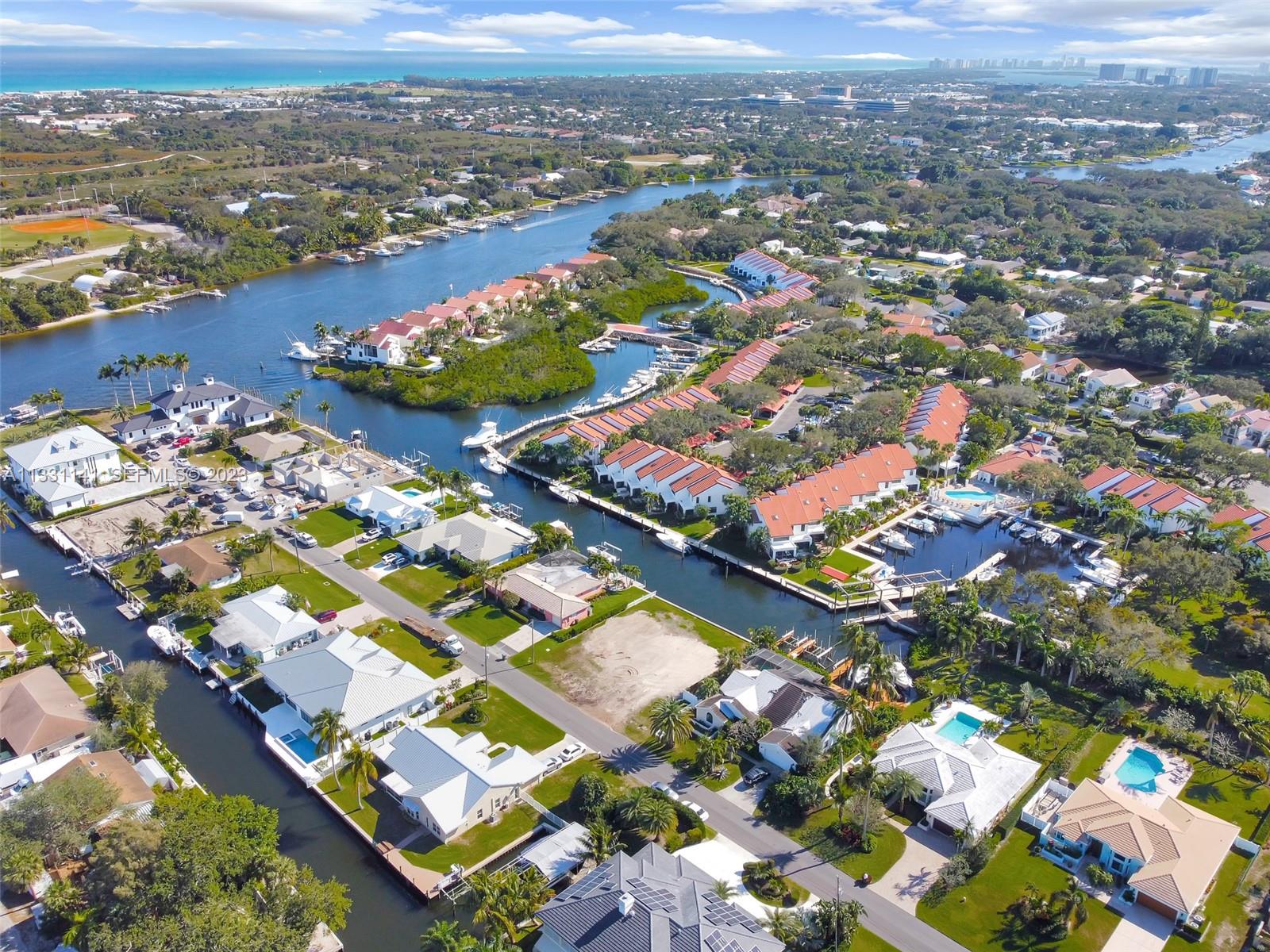 2400 Edward Road Palm Beach Gardens, FL 33410 - Photo 18 of 49 an aerial view of residential houses with outdoor space