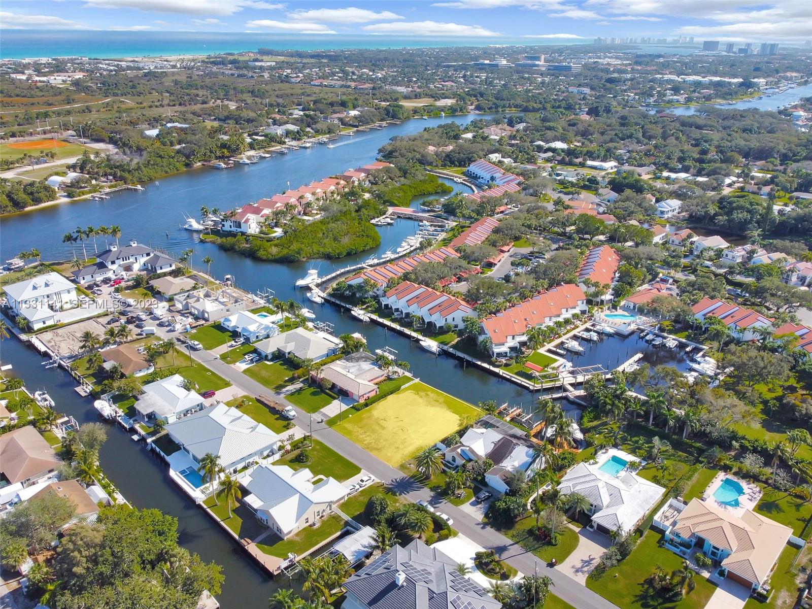 2400 Edward Road Palm Beach Gardens, FL 33410 - Photo 19 of 49 an aerial view of residential houses with outdoor space