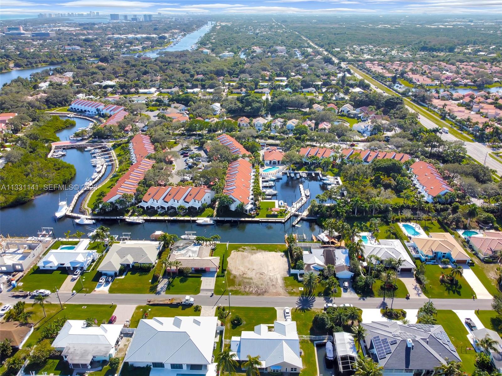 2400 Edward Road Palm Beach Gardens, FL 33410 - Photo 20 of 49 an aerial view of residential houses with outdoor space