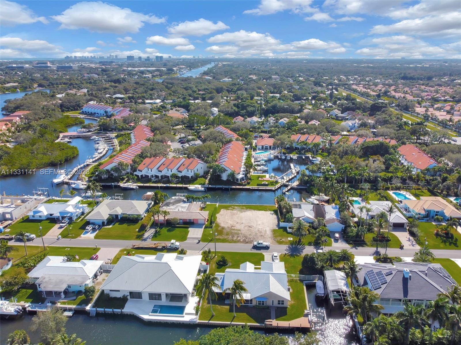 2400 Edward Road Palm Beach Gardens, FL 33410 - Photo 2 of 49 an aerial view of a houses with a swimming pool