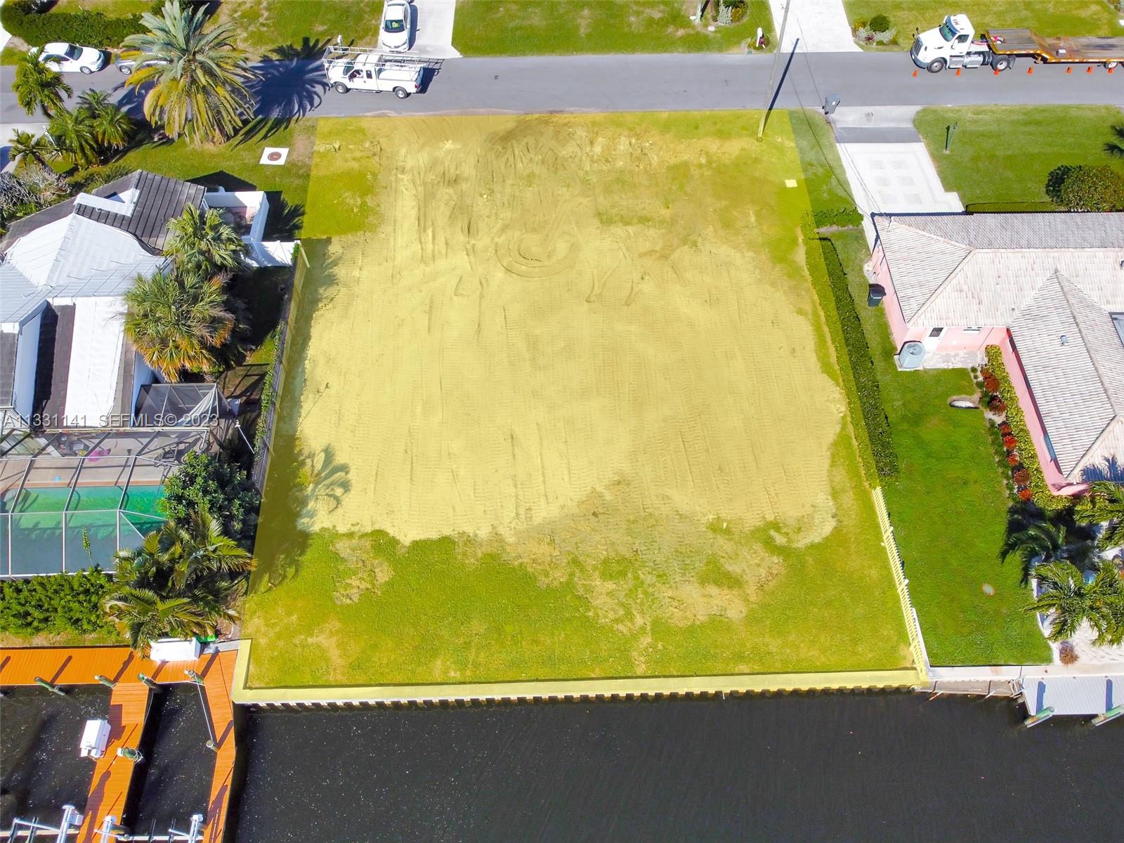 2400 Edward Road Palm Beach Gardens, FL 33410 - Photo 27 of 49 a view of a swimming pool and an outdoor space