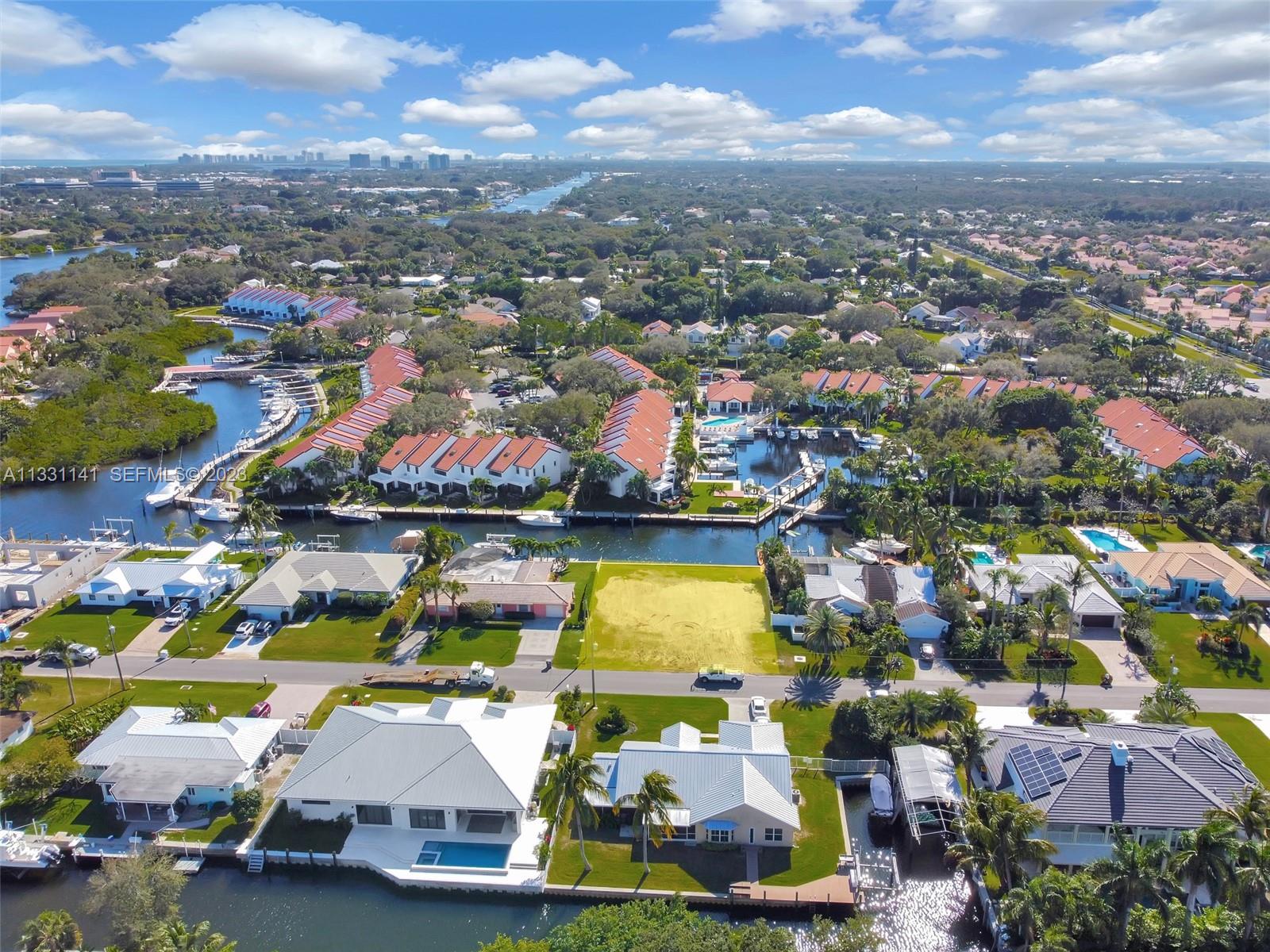 2400 Edward Road Palm Beach Gardens, FL 33410 - Photo 3 of 49 an aerial view of residential houses with outdoor space