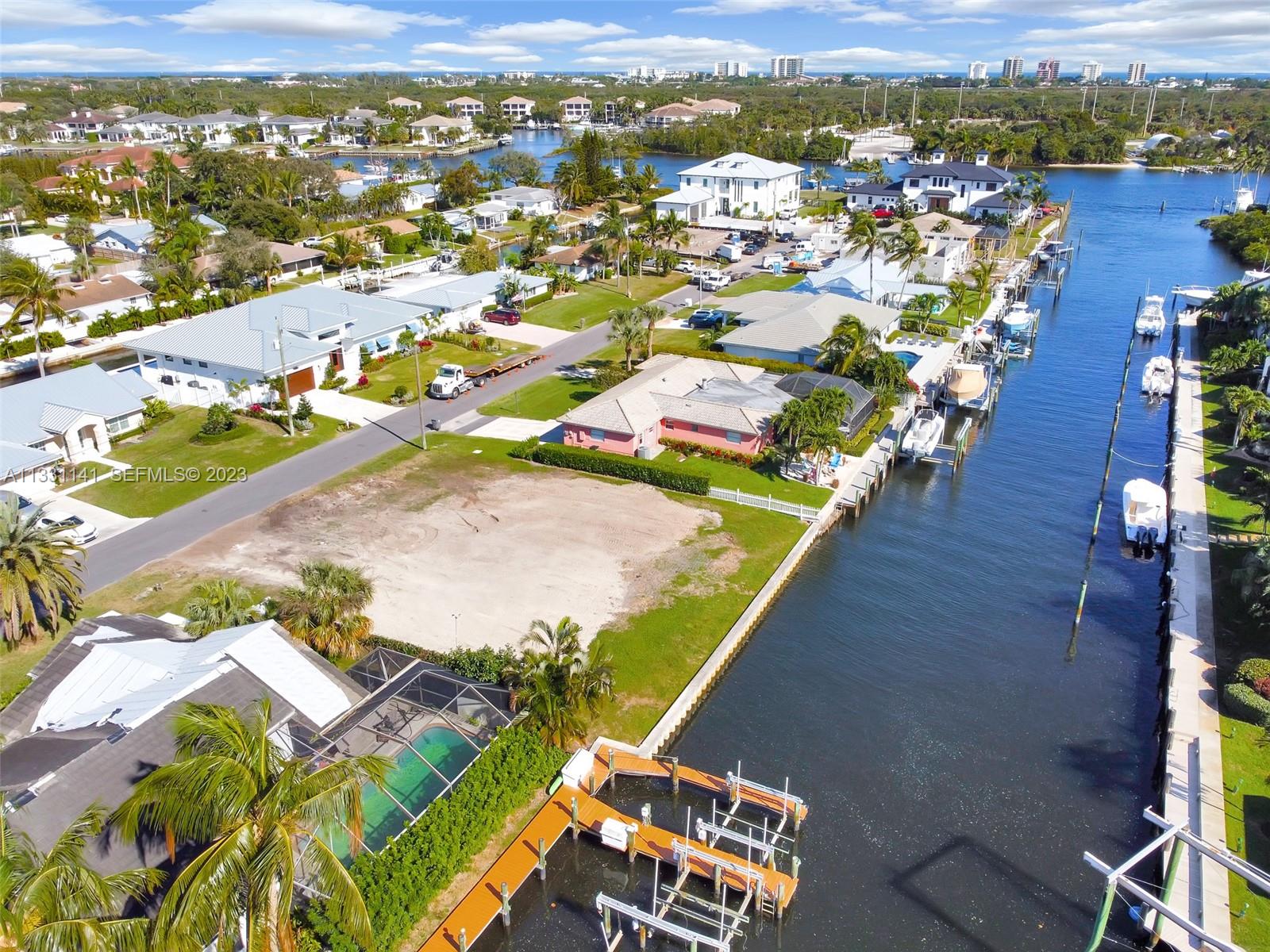 2400 Edward Road Palm Beach Gardens, FL 33410 - Photo 35 of 49 an aerial view of residential houses with outdoor space