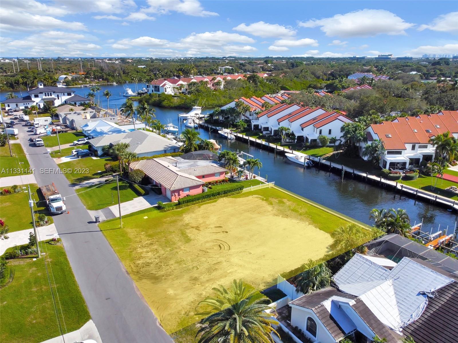 2400 Edward Road Palm Beach Gardens, FL 33410 - Photo 37 of 49 an aerial view of residential houses with outdoor space