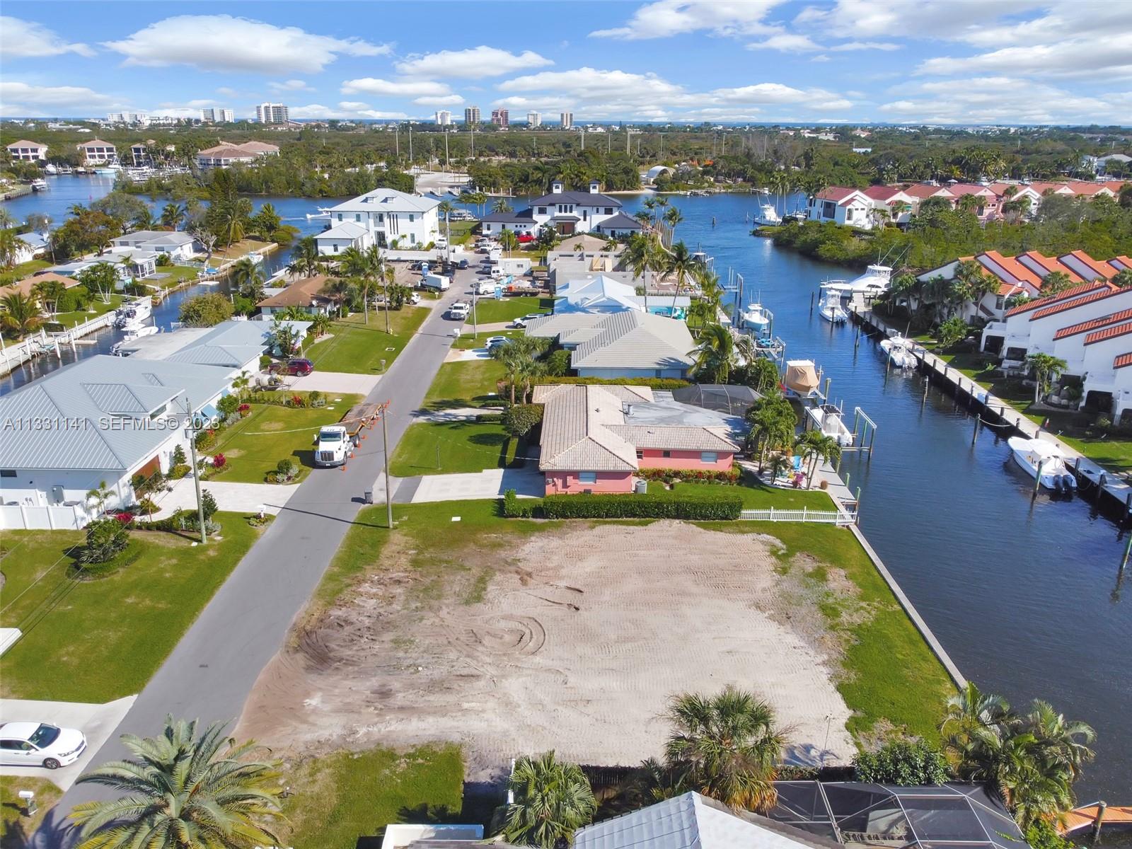 2400 Edward Road Palm Beach Gardens, FL 33410 - Photo 38 of 49 an aerial view of residential houses with outdoor space