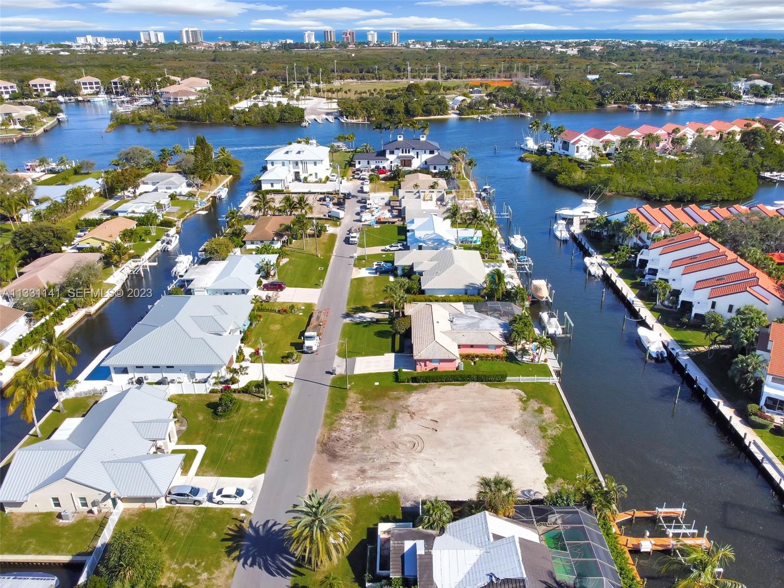 2400 Edward Road Palm Beach Gardens, FL 33410 - Photo 40 of 49 an aerial view of residential houses with outdoor space