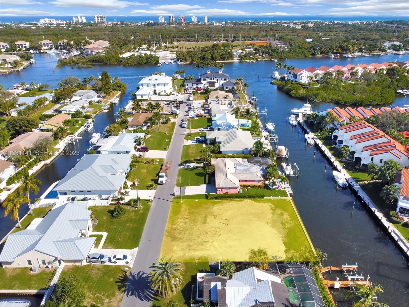 2400 Edward Road Palm Beach Gardens, FL 33410 - Photo 41 of 49 an aerial view of residential houses with outdoor space