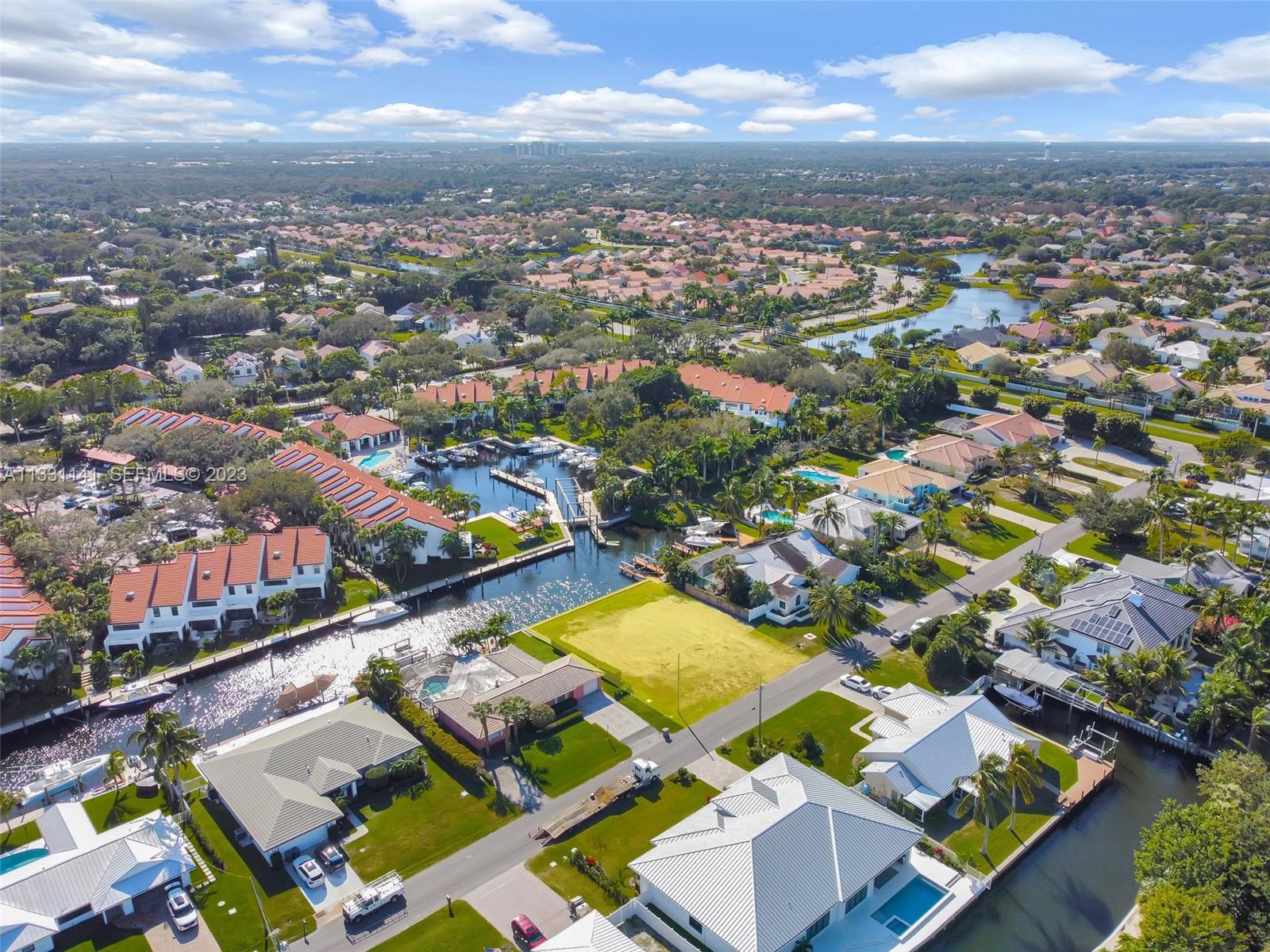 2400 Edward Road Palm Beach Gardens, FL 33410 - Photo 6 of 49 an aerial view of residential houses with outdoor space