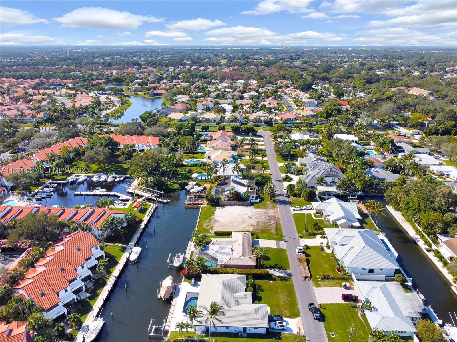 2400 Edward Road Palm Beach Gardens, FL 33410 - Photo 7 of 49 an aerial view of residential houses with outdoor space