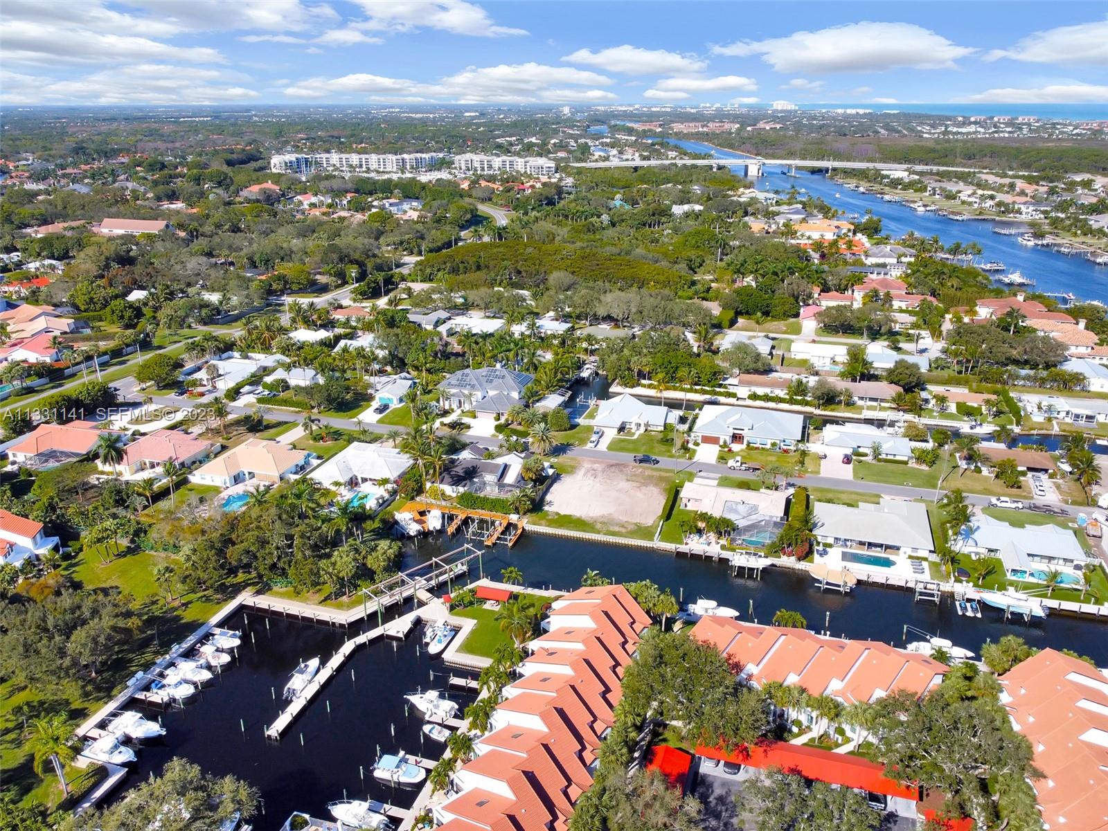 2400 Edward Road Palm Beach Gardens, FL 33410 - Photo 10 of 49 an aerial view of residential houses with outdoor space