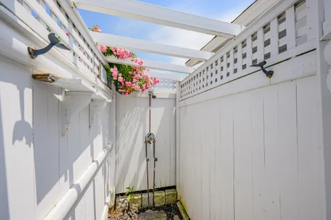 a very nice looking hallway with a flower pot