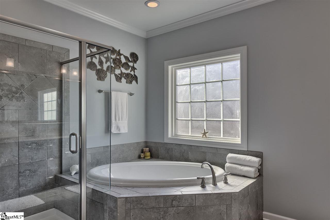 125 Belgian Blue Way Fountain Inn, SC 29644 - Photo 21 of 28 Tiled shower and soaking tub