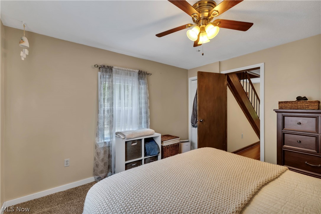 8704 Columbia Road Olmsted Falls, OH 44138 - Photo 17 of 34 Neutral tone walls with textured carpet flooring